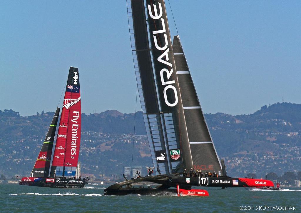 Oracle Team USA and Emirates Team NZ on Day 13, America’s Cup 2013 © Kurt Molnar